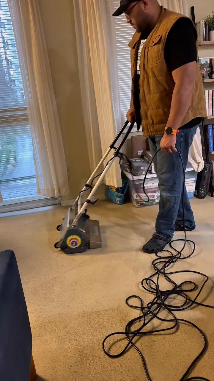 Carpet cleaning demonstration using a brush machine